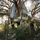 Illustration for article titled This abandoned playhouse was once an elaborate treehouse mansion